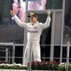 Nico Rosberg sacré champion du monde au Grand Prix of Abu Dhabi, en présence de sa femme Vivian Sibold, le 27 novembre 2016.
