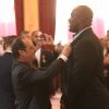 Le président de la République François Hollande remet la Légion d'Honneur à Teddy Riner (judoka) lors d'une cérémonie de remise de décorations aux médaillés olympiques et paralympiques 2016 au palais de l'Elysée à Paris, le 1er décembre 2016.