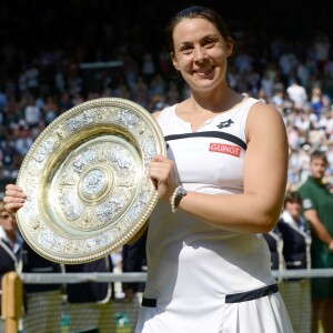 Marion Bartoli a remporté son tout premier succes en grand chelem en disposant de l'Allemande Sabine Lisicki 6-1, 6-4 en finale de Wimbledon a Londres le 6 juillet 2013.