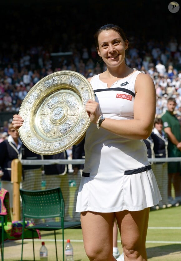 Marion Bartoli a remporté son tout premier succes en grand chelem en disposant de l'Allemande Sabine Lisicki 6-1, 6-4 en finale de Wimbledon a Londres le 6 juillet 2013.
