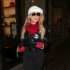 Exclusif - Mariah Carey fait du shopping dans la boutique Louis Vuitton en buvant du champagne à Aspen dans le Colorado le 23 décembre 2016.