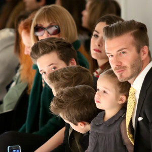 David Beckham et ses enfants Brooklyn, Romeo, Cruz et Harper assistent au défilé de Victoria Beckham, collection prêt-à-porter automne 2014 à New York, le 9 février 2014.