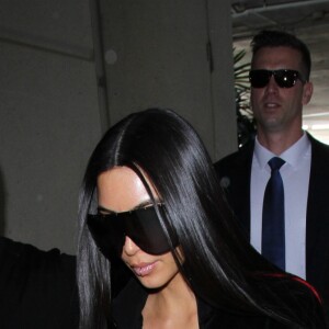 Kim Kardashian et Scott Disick vont prendre un avion à l'aéroport de Los Angeles le 12 janvier 2017