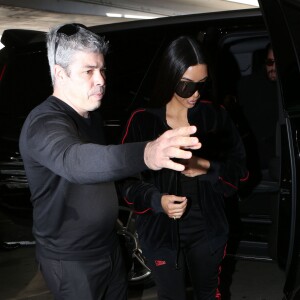 Kim Kardashian et Scott Disick arrivent à l'aéroport de Los Angeles le 11 janvier 2017.