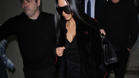 Kim Kardashian et Scott Disick arrivent à l'aéroport de Los Angeles le 11 janvier 2017.