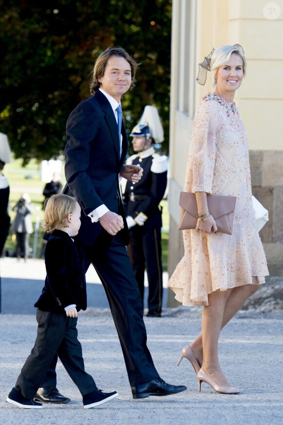 Jan Dinkelspiel, sa femme Ellen et leur fils au baptême du prince Nicolas de Suède à la chapelle du palais Drottningholm à Stockholm, le 11 octobre 2015