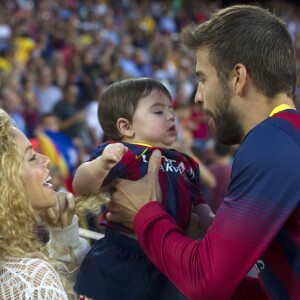 Shakira, Gerard Pique et leur fils Milan à Barcelone, le 14 septembre 2013.