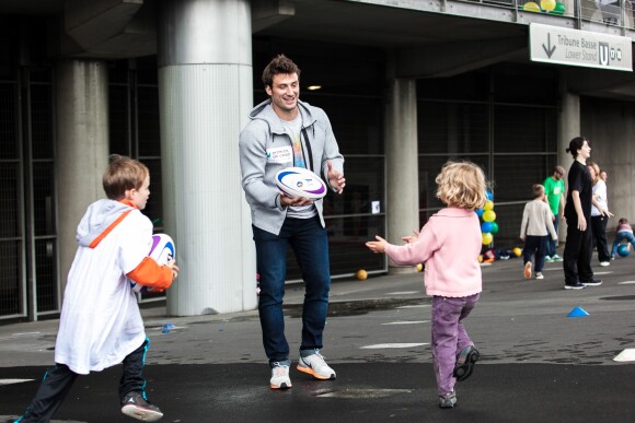 Maxime Médard lors d'une journée évasion organisée par l'association "Premiers de Cordée" pour le 10e anniversaire de la "Semaine du Sport à l'Hôpital" au Stade de France, le 21 mai 2014.