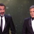 George Clooney et Jean Dujardin pendant les César 2017.