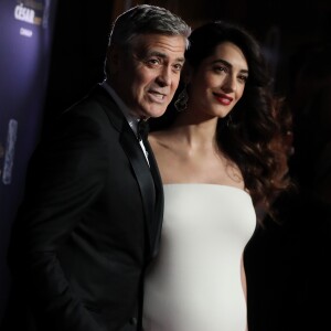 George Clooney et sa femme Amal Alamuddin-Clooney, enceinte - Photocall de la 42e cérémonie des Cesar à la salle Pleyel à Paris, le 24 février 2017. © Dominique Jacovides - Olivier Borde / Bestimage