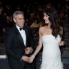 George Clooney (montre Omega) et sa femme Amal Alamuddin clooney (robe Atelier Versace)  très complice lors de la 42e cérémonie des César à la salle Pleyel à Paris le 24 février 2017. © Olivier Borde / Dominique Jacovides / Bestimage