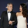 George Clooney (montre Omega) et sa femme Amal Alamuddin-Clooney enceinte (robe Atelier Versace) arrivant à la 42e cérémonie des César à la Salle Pleyel à Paris le 24 février 2017. © Olivier Borde / Dominique Jacovides / Bestimag