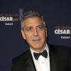George Clooney (montre Omega) (montre de la marque Omega) et sa femme Amal Alamuddin-Clooney (enceinte) arrivant à la 42e cérémonie des César à la Salle Pleyel à Paris le 24 février 2017. © Olivier Borde / Dominique Jacovides / Bestimag