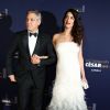 George Clooney (montre Omega) et sa femme Amal Alamuddin-Clooney (robe Atelier Versace) arrivant à la 42e cérémonie des César à la Salle Pleyel à Paris le 24 février 2017. © Olivier Borde / Dominique Jacovides / Bestimage
