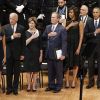 Laura Bush, George Bush, Michelle Obama et Barack Obama assistent à une cérémonie d'hommage pour des policiers morts à Dallas, le 12 juillet 2016