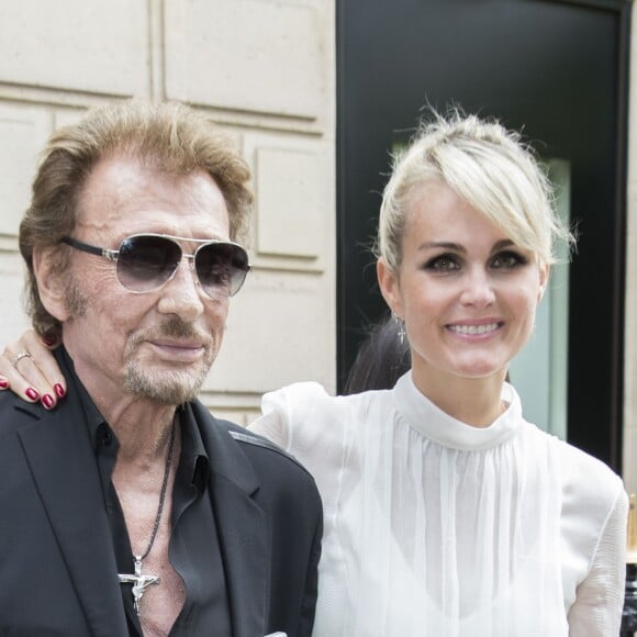 Johnny Hallyday et sa femme Laeticia Hallyday - People au défilé de mode Haute-Couture automne-hiver 2016/2017 "Christian Dior" à Paris. Le 4 juillet 2016