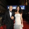 Exclusif - George Clooney (montre Omega) et sa femme Amal Clooney (enceinte) - Arrivées à la 42ème cérémonie des Cesar à la salle Pleyel à Paris, le 24 février 2017.