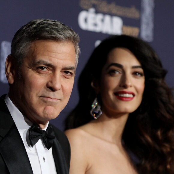 George Clooney et sa femme Amal Clooney (enceinte) - Photocall de la 42ème cérémonie des Cesar à la salle Pleyel à Paris, le 24 février 2017. © Dominique Jacovides - Olivier Borde / Bestimage