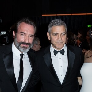 Nathalie Péchalat, Amal Clooney (enceinte) - George Clooney (montre Omega) retrouve son complice Jean Dujardin à la 42ème cérémonie des César à la salle Pleyel à Paris le 24 février 2017. © Olivier Borde / Dominique Jacovides / Bestimage