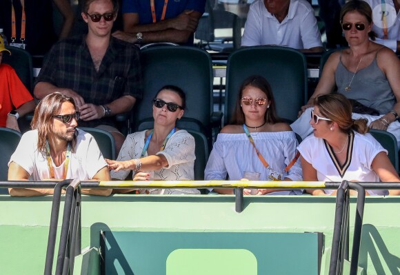 Bob Sinclar, sa femme Ingrid et Mirka (Miroslava) Vavrinec-Federer dans les tribunes lors du Master 1000 de Miami à Key Biscayne, Floride, Etats-Unis, le 27 mars 2017.
