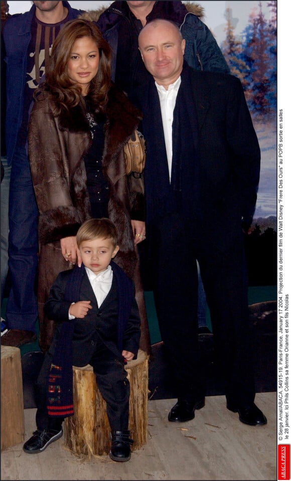 Phil Collins sa femme Orianne et son fils Nicolas lors de la Projection du dernier film de Walt Disney Frere Des Ours au POPB, le 17 janvier 2004 © Serge Arnal