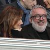 Dominique Farrugia et sa femme Isabelle - Huitième de finale retour entre le Paris Saint-Germain et le Bayer Leverkusen au Parc des Princes remporté par les parisiens sur le score de 2-1 à Paris le 12 mars 2014.