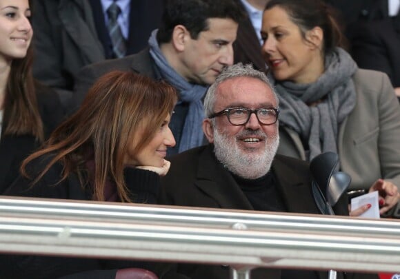 Dominique Farrugia et sa femme Isabelle - Huitième de finale retour entre le Paris Saint-Germain et le Bayer Leverkusen au Parc des Princes remporté par les parisiens sur le score de 2-1 à Paris le 12 mars 2014.