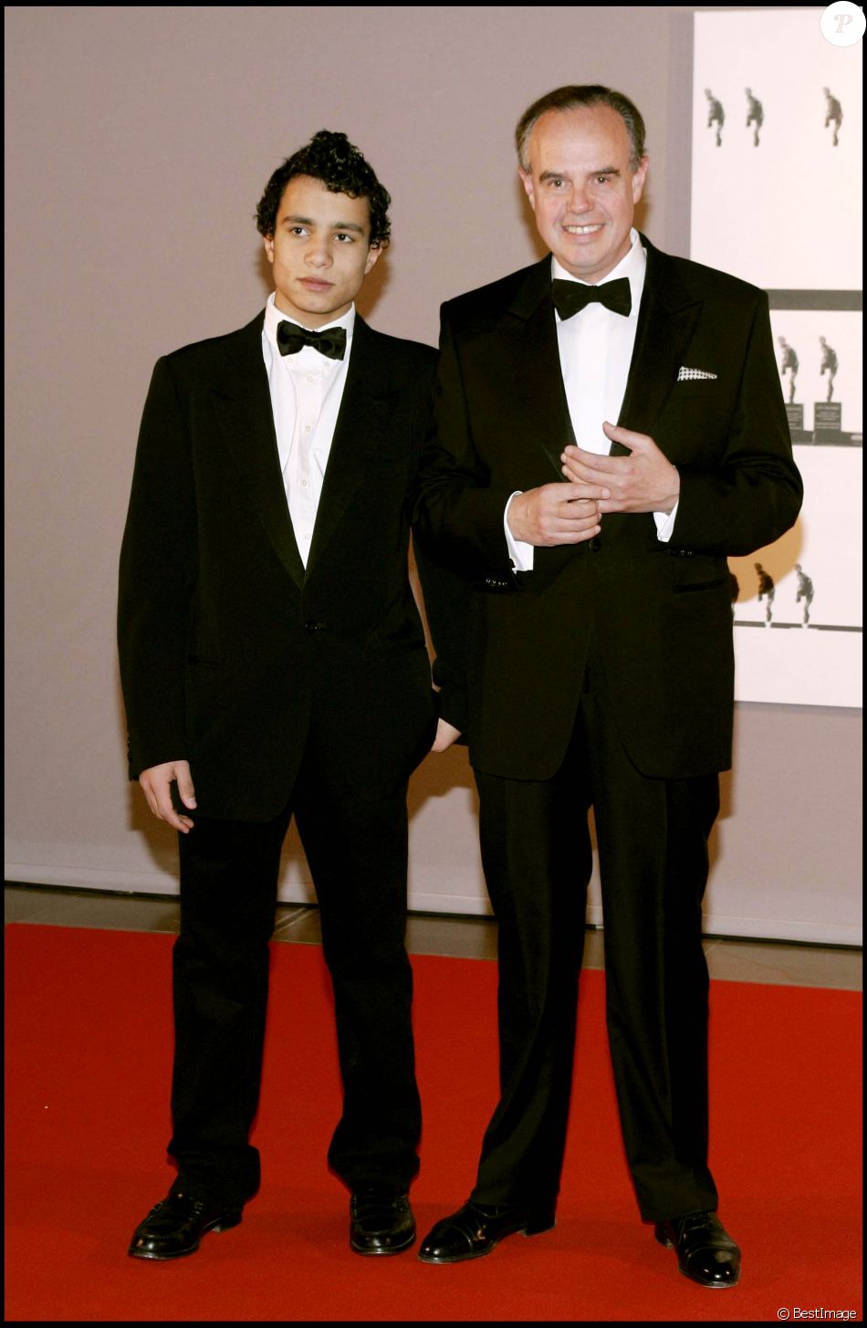  Frédéric Mitterrand et son fils Jihed - Soirée au Monaco Dance Forum, le 18 décembre 2004 
  