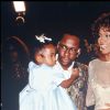 Whitney Houston et son mari Bobby Brown ainsi leur fille Bobbi Kristina à la première de Cinderella, le 22 octobre 1997