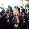 Charlize Theron (en robe Christian Dior et bijoux Chopard) - Montée des marches de la Soirée du 70ème Anniversaire du Festival de Cannes. Le 23 mai 2017