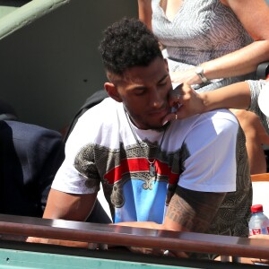 Tony Yoka et sa compagne Estelle Mossely - Personnalités dans les tribunes lors des internationaux de France de Roland Garros à Paris. Le 10 juin 2017. © Jacovides - Moreau / Bestimage