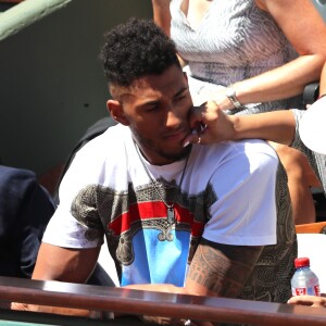 Tony Yoka et sa compagne Estelle Mossely - Personnalités dans les tribunes lors des internationaux de France de Roland Garros à Paris. Le 10 juin 2017. © Jacovides - Moreau / Bestimage