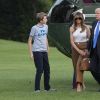 Le président des États-Unis Donald J. Trump, son épouse Melania Trump et leur fils Barron Trump rentrent à la Maison-Blanche. Washington, le 11 juin 2017.