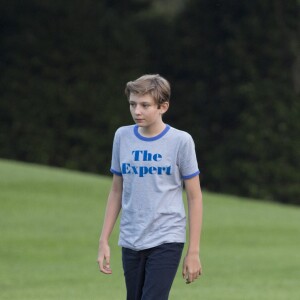 Le président des États-Unis Donald J. Trump, son épouse Melania Trump et leur fils Barron Trump rentrent à la Maison-Blanche. Washington, le 11 juin 2017.