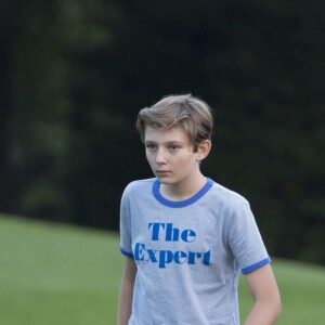 Le président des États-Unis Donald J. Trump, son épouse Melania Trump et leur fils Barron Trump rentrent à la Maison-Blanche. Washington, le 11 juin 2017.