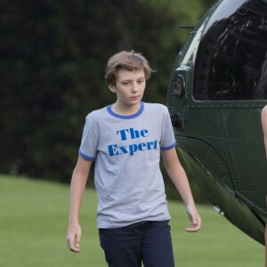 Le président des États-Unis Donald J. Trump, son épouse Melania Trump et leur fils Barron Trump rentrent à la Maison-Blanche. Washington, le 11 juin 2017.