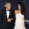 George Clooney (montre Omega) (montre de la marque Omega) et sa femme Amal Alamuddin-Clooney (enceinte) arrivant à la 42e cérémonie des César à la Salle Pleyel à Paris le 24 février 2017. © Olivier Borde / Dominique Jacovides / Bestimage