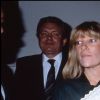 Archives - Jeanne-Marie Martin le jour de son baptême dans les bras de sa marraine Marie-Dominique Culioli, première épouse de Nicolas Sarkozy. A leurs côtés, Jacques Martin (à gauche) et Cécilia Attias (ex-Martin) avec sa fille aînée Judith dans les bras, octobre 1987