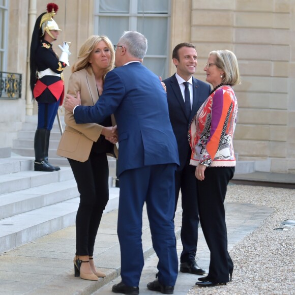 Le président de la République française Emmanuel Macron et sa femme la première dame Brigitte Macron reçoivent le premier ministre d'Australie, Malcolm Turnbull et sa femme Lucy Turnbull pour un dîner de travail au Palais de l'Elysée à Paris, France, le 8 juillet 2017. © Giancarlo Gorassini/Bestimage