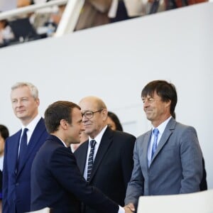 Le président de la République, Emmanuel Macron, Jean-Yves Le Drian et Nicolas Hulot lors du défilé du 14 juillet (fête nationale), place de la Concorde, à Paris, le 14 juillet 2017, avec comme invité d'honneur le président des Etats-Unis. © Denis Allard/Pool/Bestimage