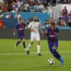 Barcelona forward Neymar, middle, attempt a shot against Real Madrid goalkeeper Keylor Navas, second from right, during the second half of the International Champions Cup match on Saturday, July 29, 2017, at Hard Rock Stadium in Miami Gardens, Fla. Barcelona won, 3-2. (David Santiago/El Nuevo Herald/TNS)29/07/2017 - 