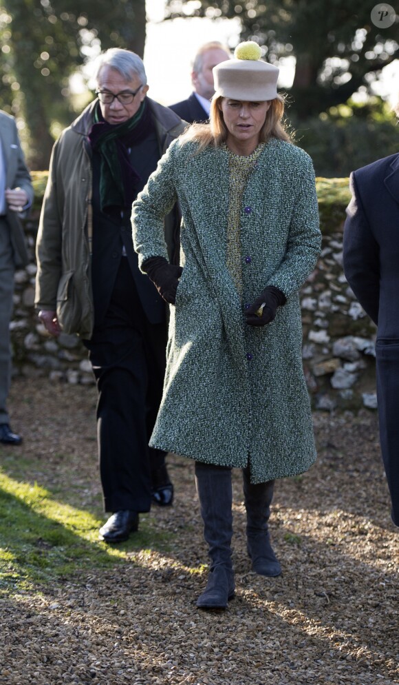 Sir David Tang et sa femme Lucy à la messe dominciale en l'église de Hillington le 17 janvier 2016, en présence de la reine Elisabeth II et du duc d'Edimbourg.
