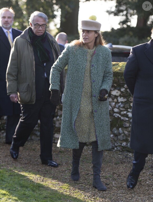 Sir David Tang et sa femme Lucy à la messe dominciale en l'église de Hillington le 17 janvier 2016, en présence de la reine Elisabeth II et du duc d'Edimbourg.