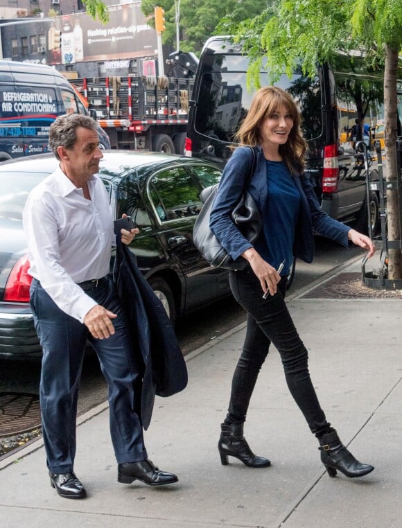 Exclusif - No Web - Carla Bruni-Sarkozy et son mari l'ancien Président Nicolas Sarkozy quittent un hôtel de New York le 14 juin 2017.