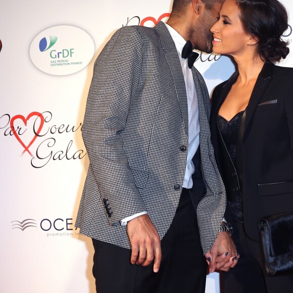 Tony Parker et sa femme Axelle au gala "Par Coeur" pour les 10 ans de l'association "Cekedubonheur" au pavillon d'Armenonville à Paris le 24 septembre 2015