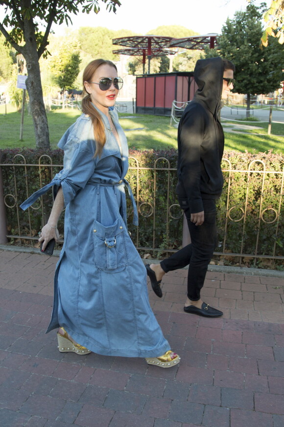 Lindsay Lohan et un ami dans un parc d'attractions à Madrid, le 18 septembre 2017.18/09/2017 - Madrid