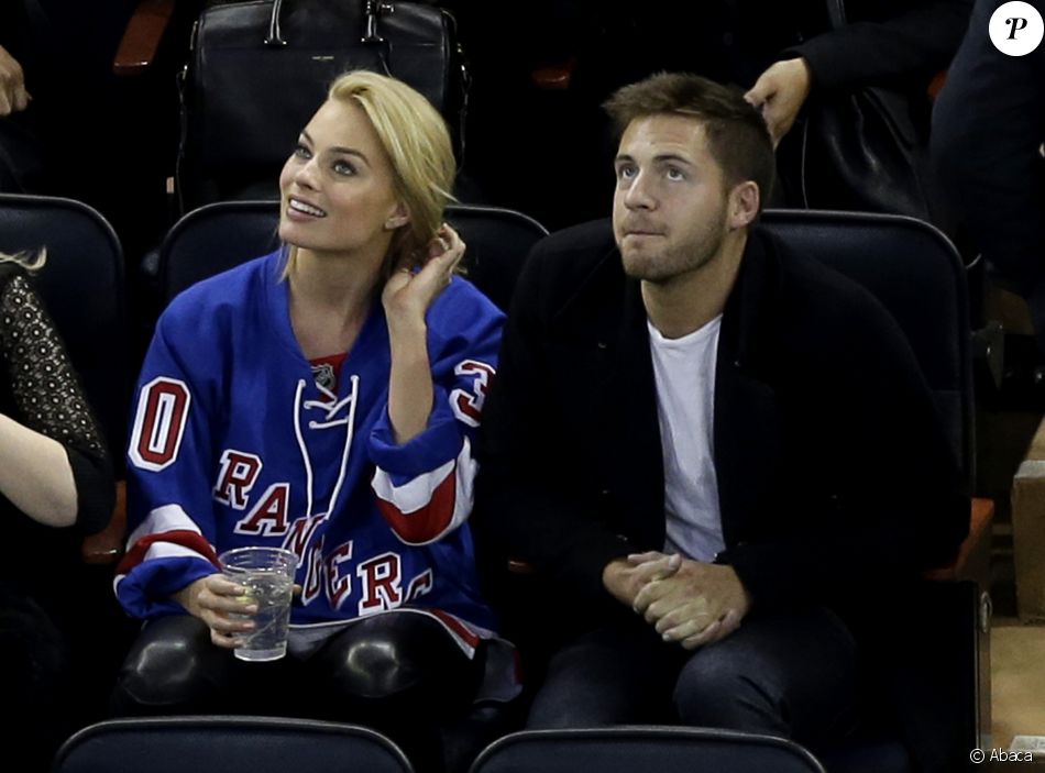 Margot Robbie et Tom Ackerley lors d&#039;un match de hockey au Madison Square Garden à New York le 26 février 2015