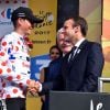 Le président de la République Emmanuel Macron et Warren Barguil (équipe cycliste Sunweb) lors de l'arrivée de la 17ème étape du 104ème Tour de France à Salle-des-Alpes (Serre Chevalier), le 19 juillet 2017. © Bruno Bébert/Bestimage