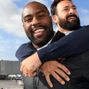 Teddy Riner et Michael Jeremiasz, retour de la délégation Paris 2024 à l'aéroport Charles de Gaulle à Paris le 15 septembre 2017.