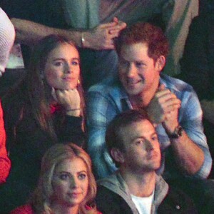 Le prince Harry et Cressida Bonas lors du WE Day à Londres le 7 mars 2014.
